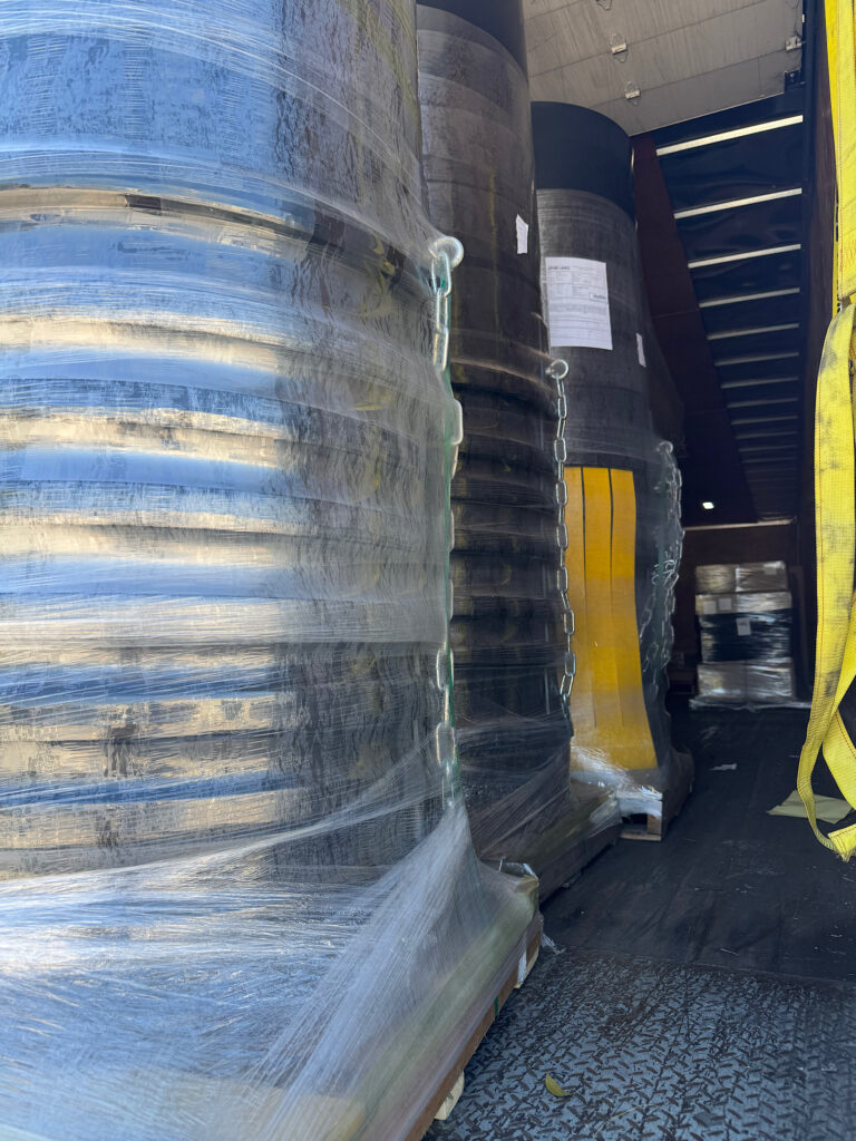 Plastic construction debris chute system available to buy or rent in Canada for roofing, demolition, and renovation projects